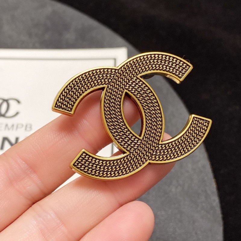 Ch**el brooches